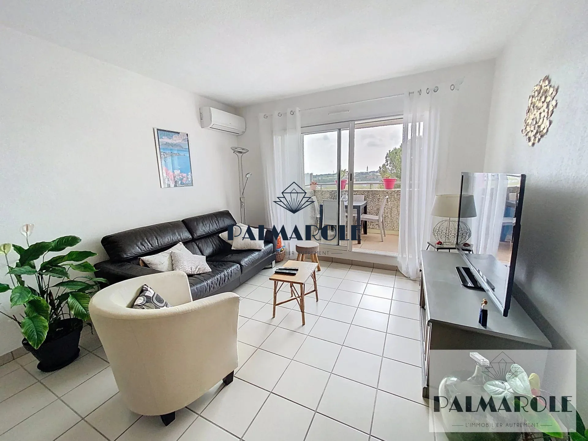 Appartement T3 à vendre à Perpignan avec balcon, garage et locataire en place