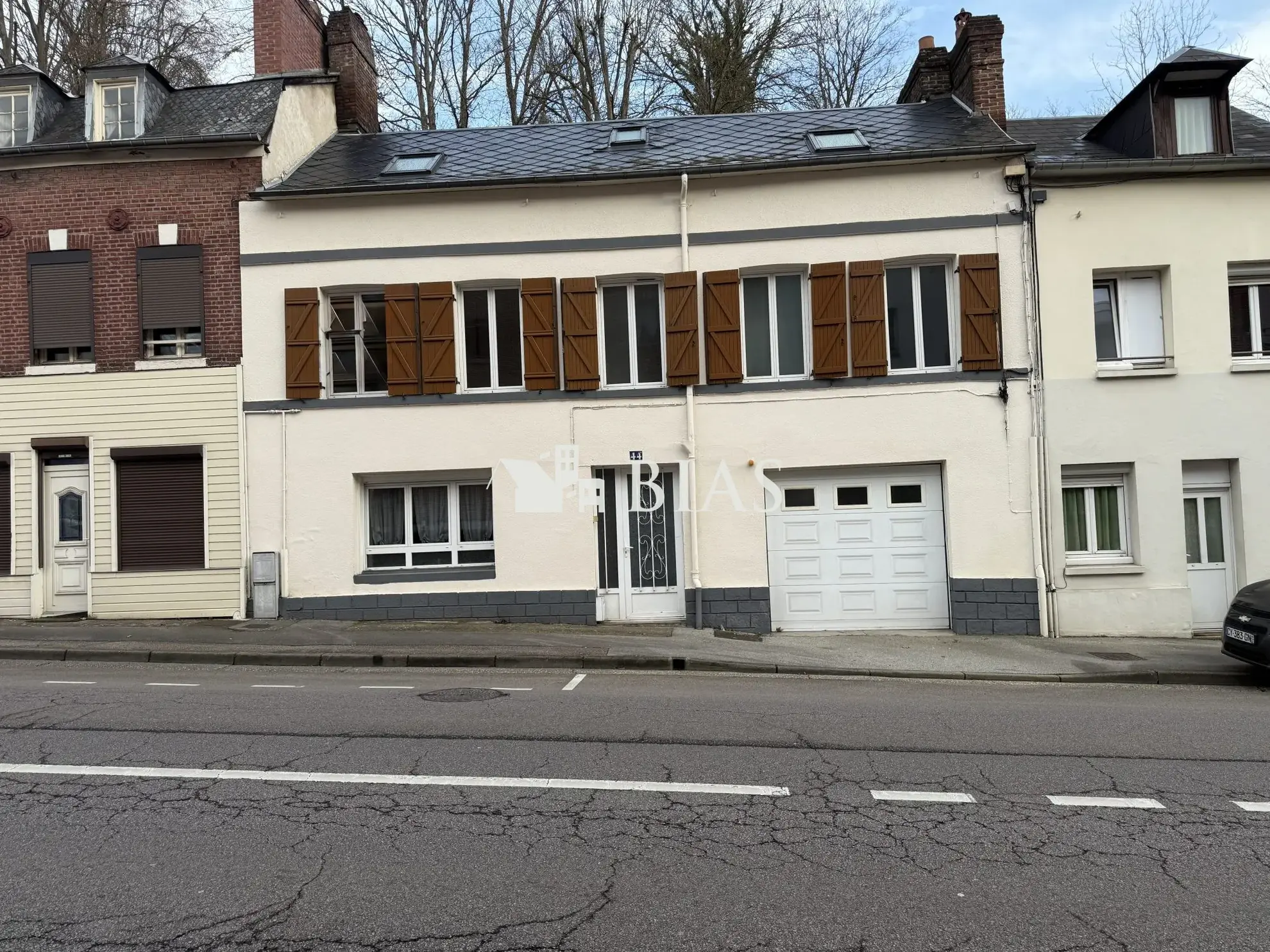Maison de ville avec jardin à Elbeuf, 4 chambres et garage - Expert en immobilier