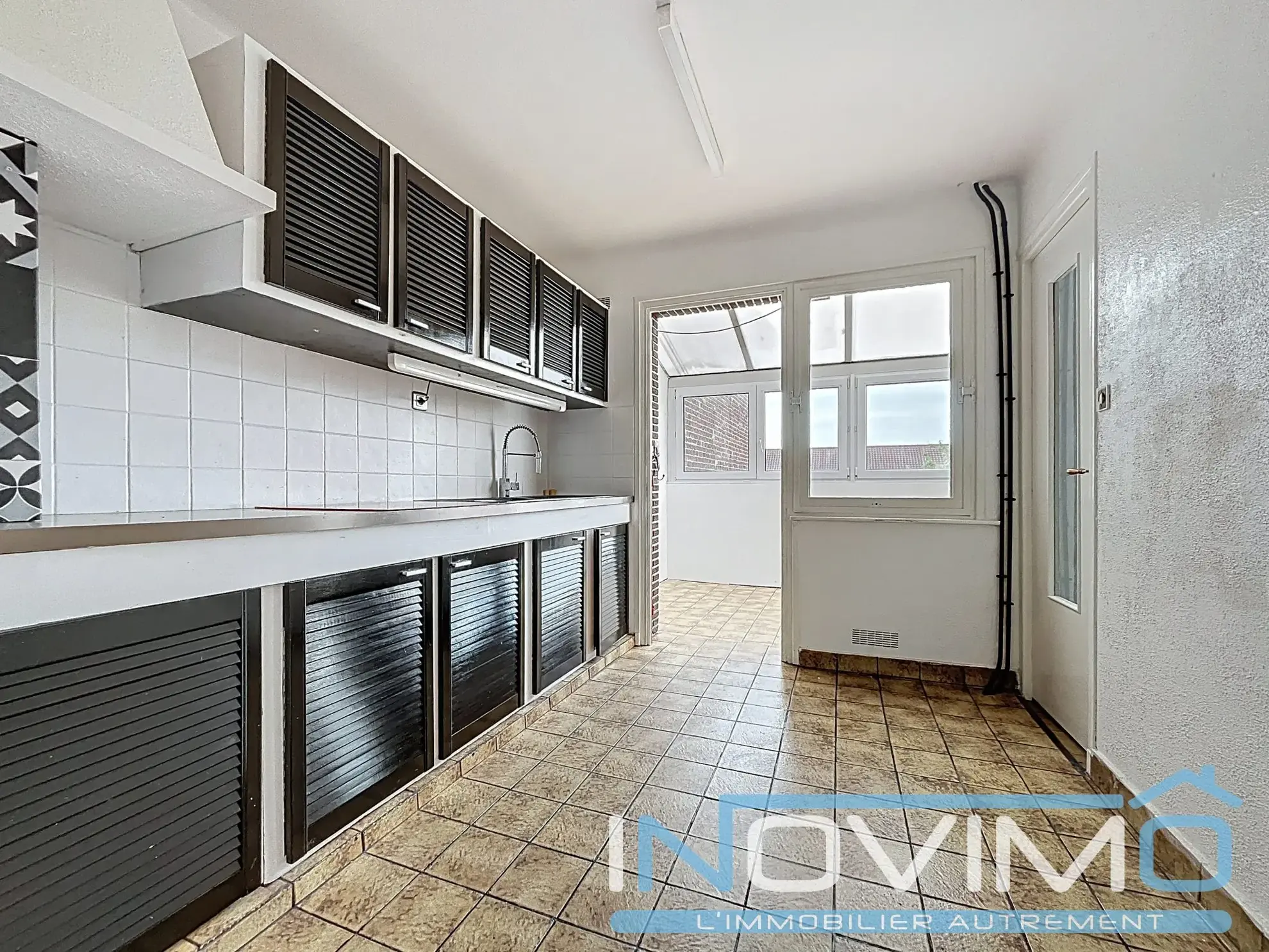 Maison à vendre à Petite-synthe, Dunkerque - 125 m² avec garage et hangar