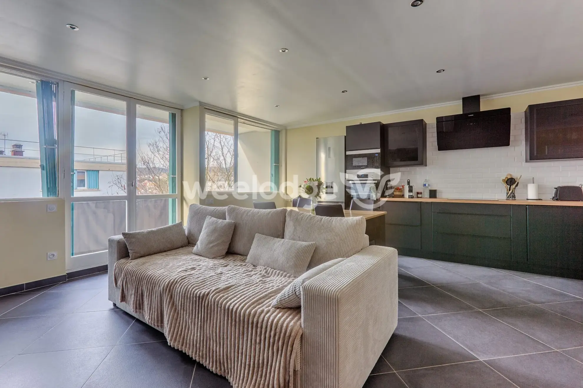 Appartement à vendre à Andrésy avec balcon, cave et parking, proche écoles et gare 