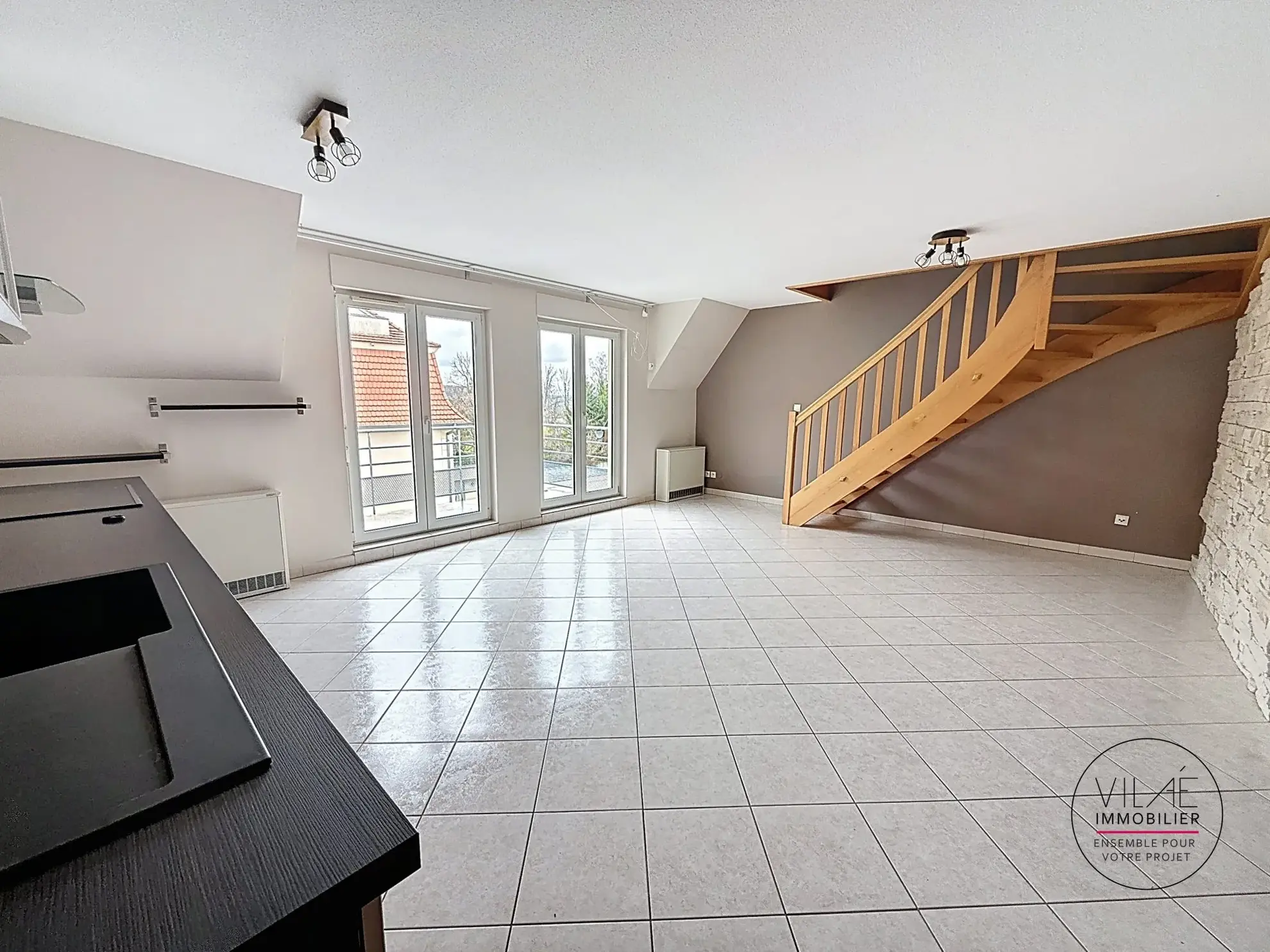 À vendre duplex 2 pièces avec balcon, cave et parking à Saint-Nabor 