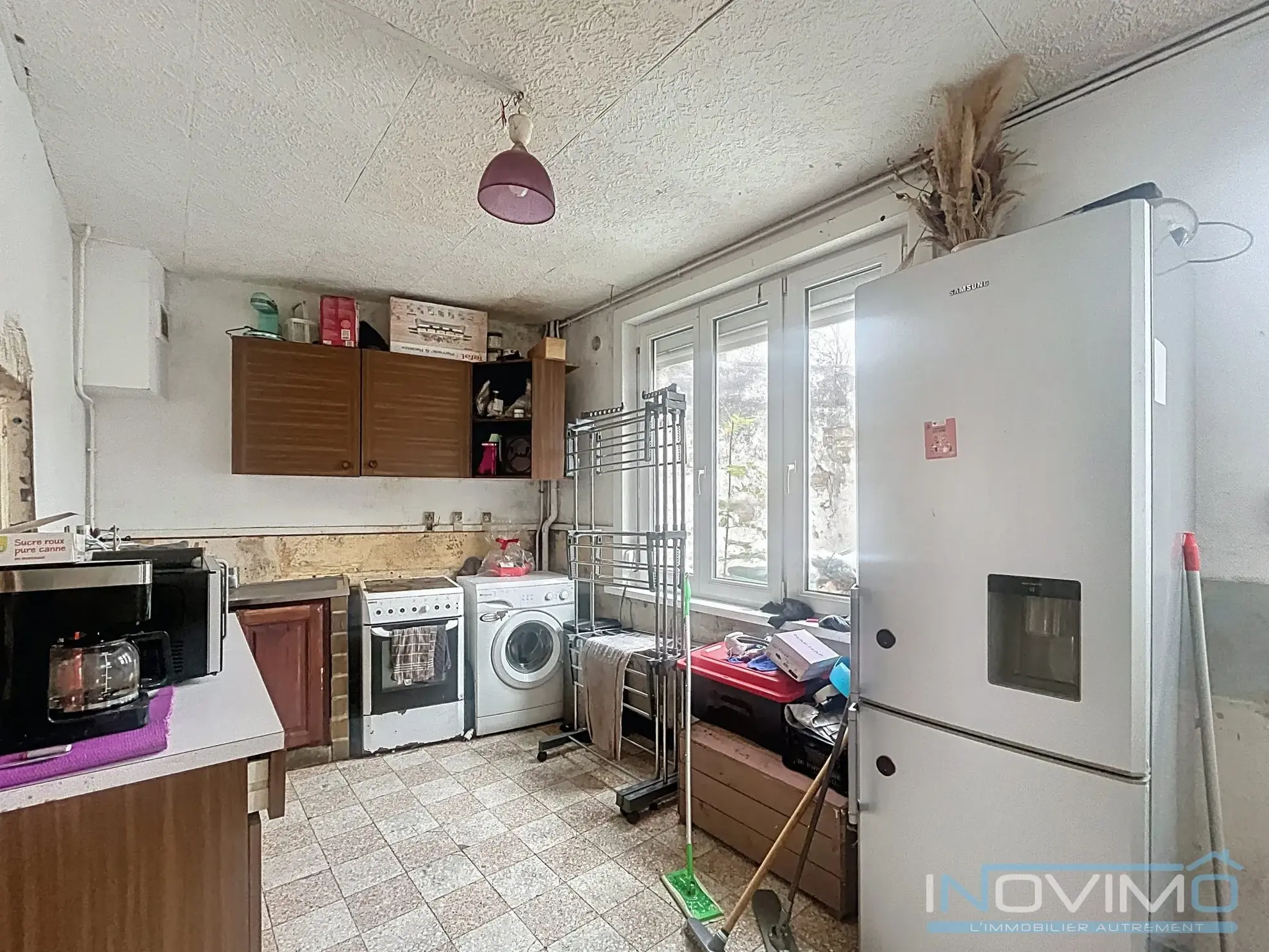 Maison semi-individuelle à rénover à Bourbourg – 57 m² avec cour et dépendance 