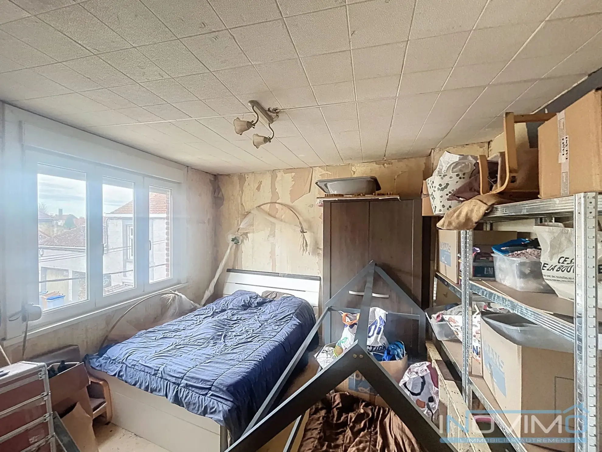 Maison semi-individuelle à rénover à Bourbourg – 57 m² avec cour et dépendance 