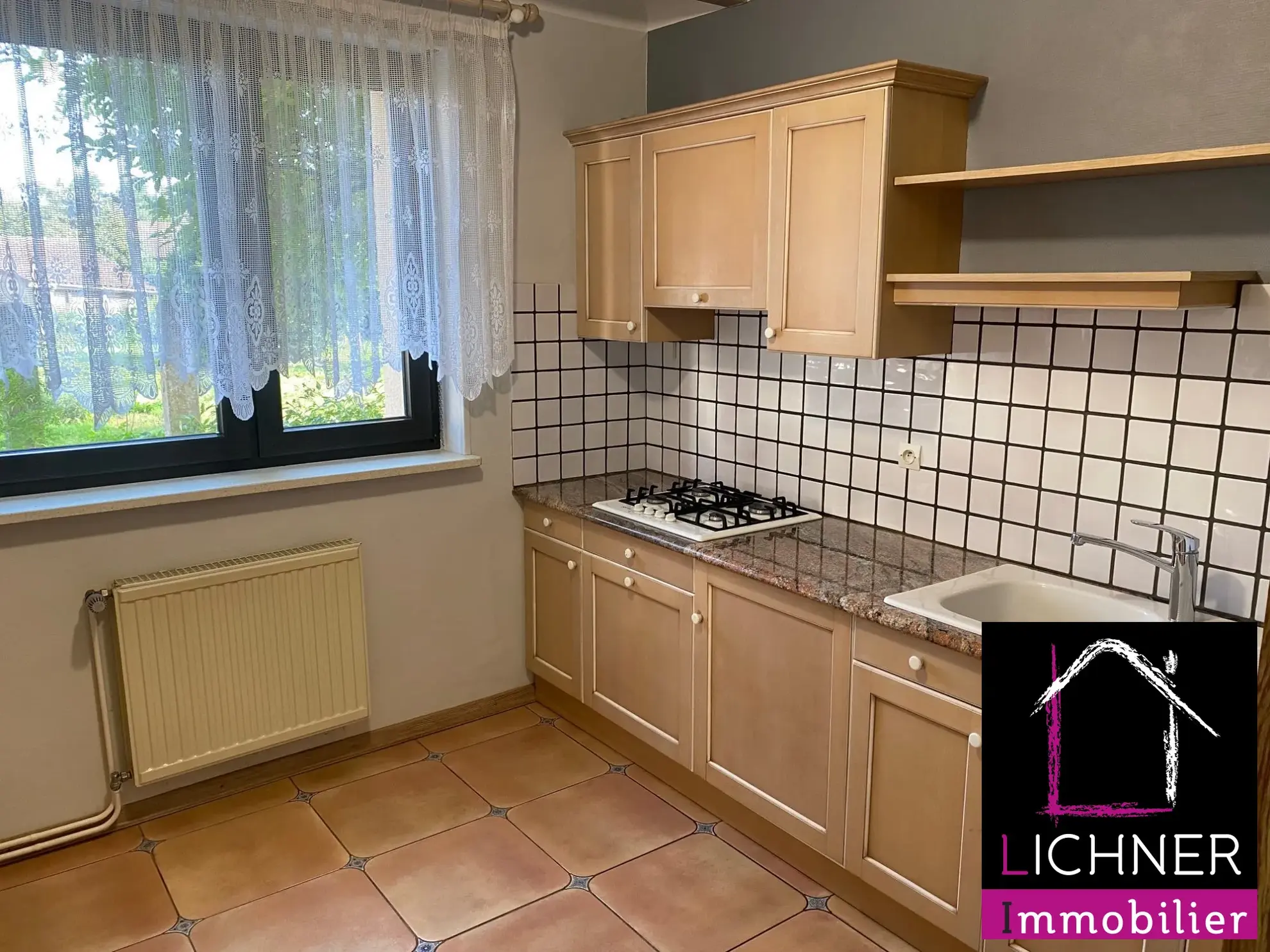 A vendre ensemble immobilier de deux maisons à Barst avec garage et potentiel de rénovation 