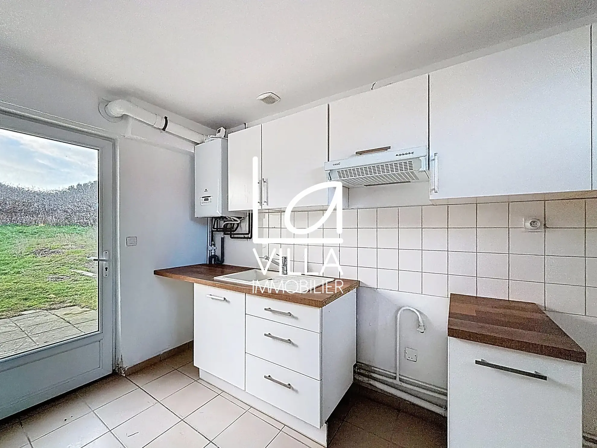 Maison mitoyenne à Wimereux de 58 m² avec jardin, idéale pour personnaliser votre espace de vie 