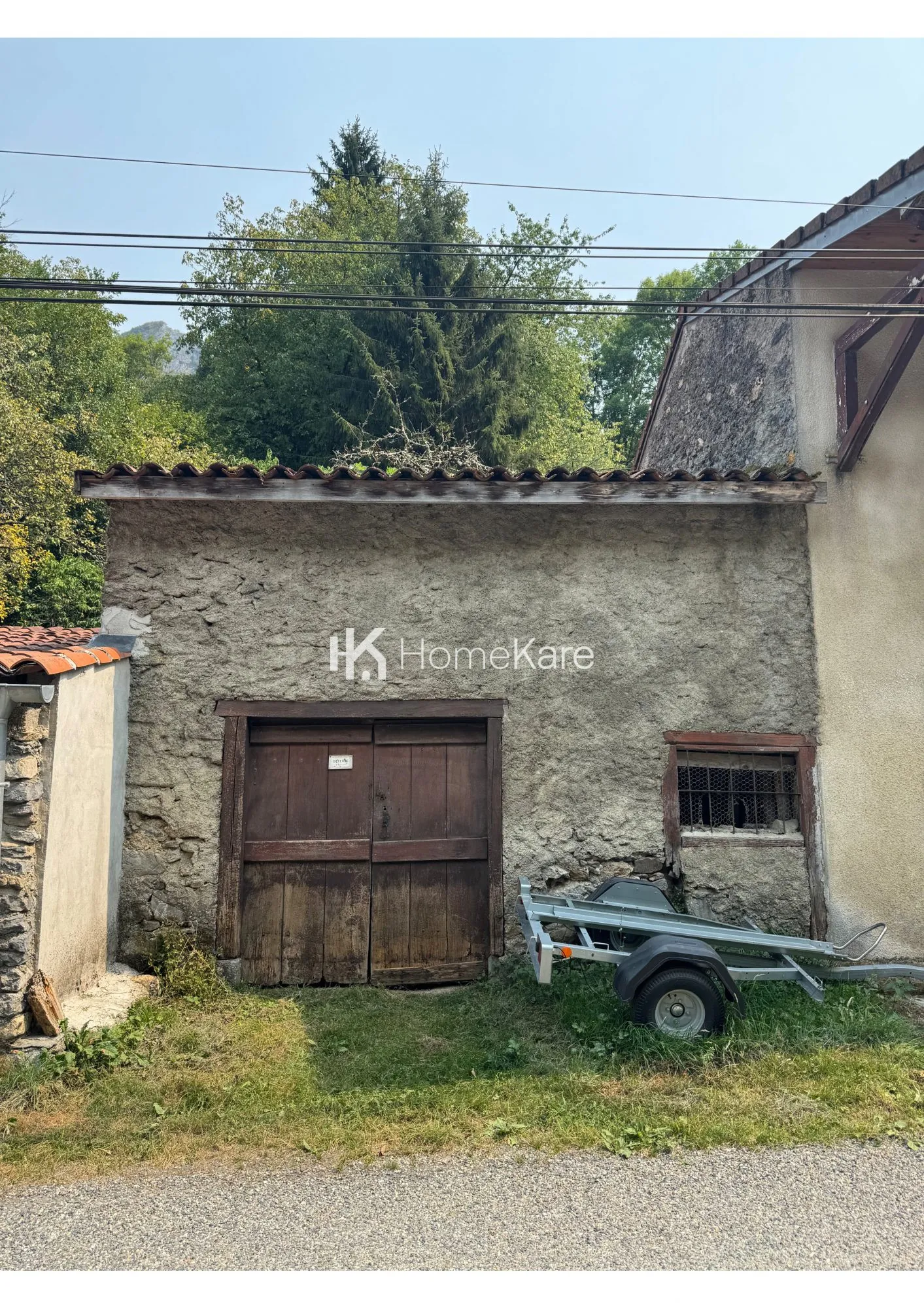 Maison à vendre à Nistos avec terrasse et vue sur la rivière dans un environnement naturel 