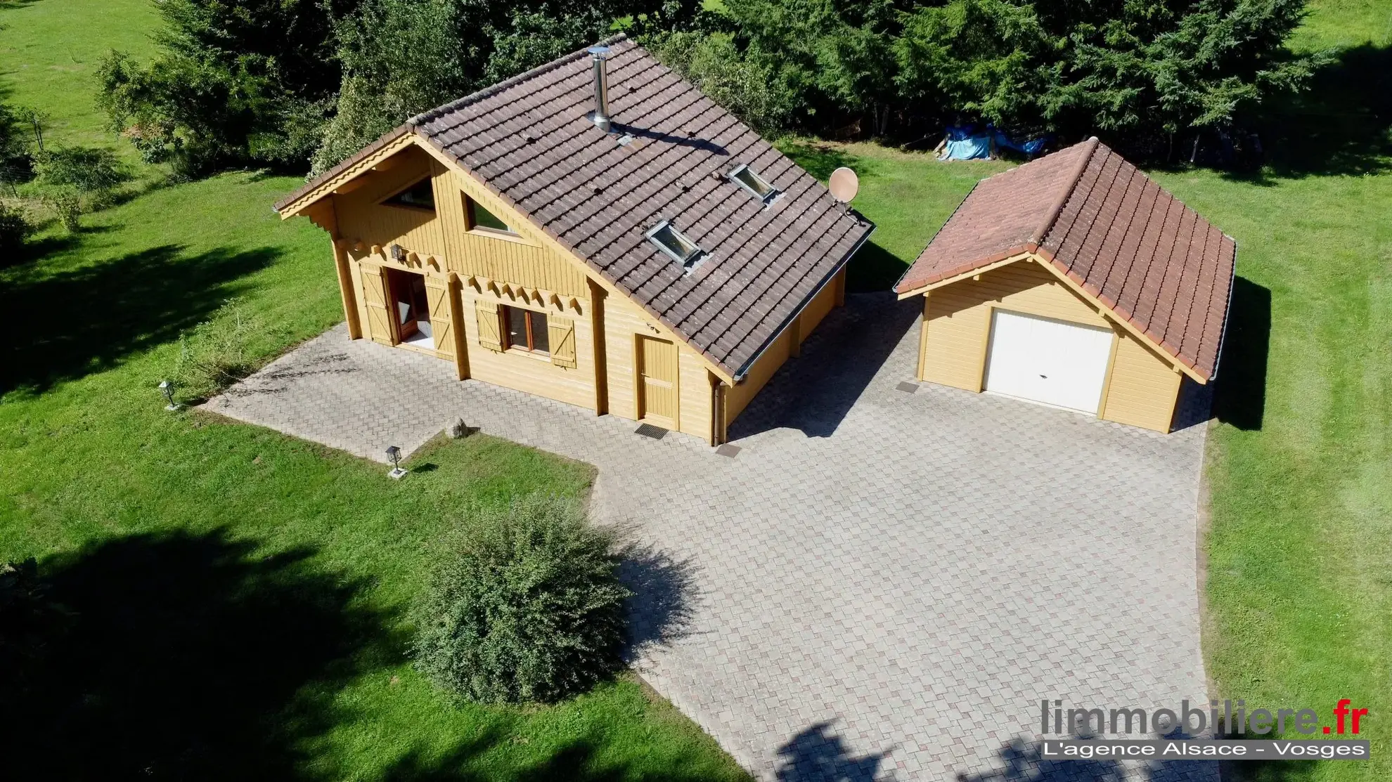 Chalet en madrier à vendre à Ban-de-Laveline dans un cadre paisible 