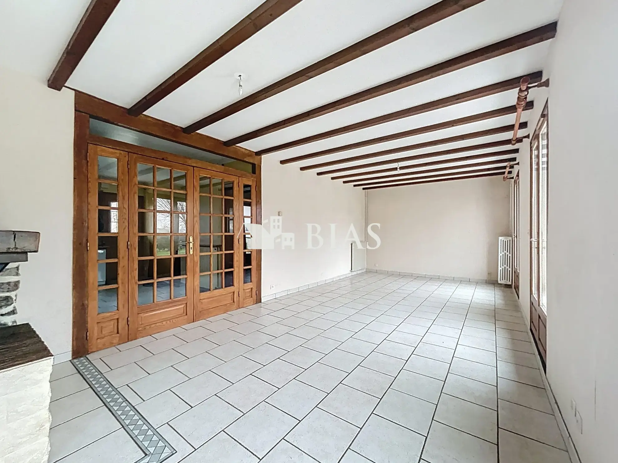 Maison de plain-pied avec terrasse, garage et cave à Saint-Pierre-lès-Elbeuf 