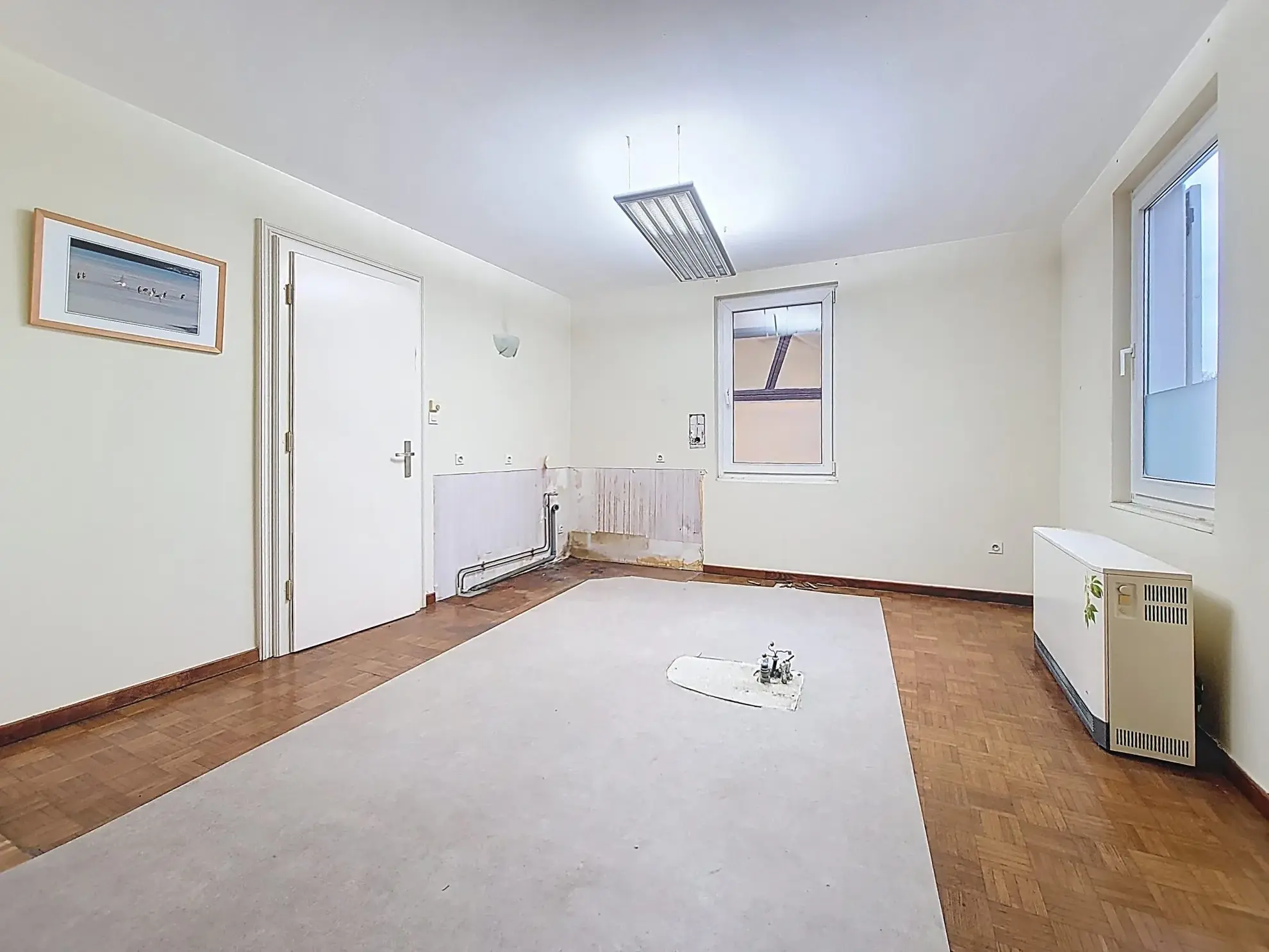 Séjour (Salon-Cuisine) Appartement T3 à La Wantzenau avec fort potentiel de rénovation, proche commerces 