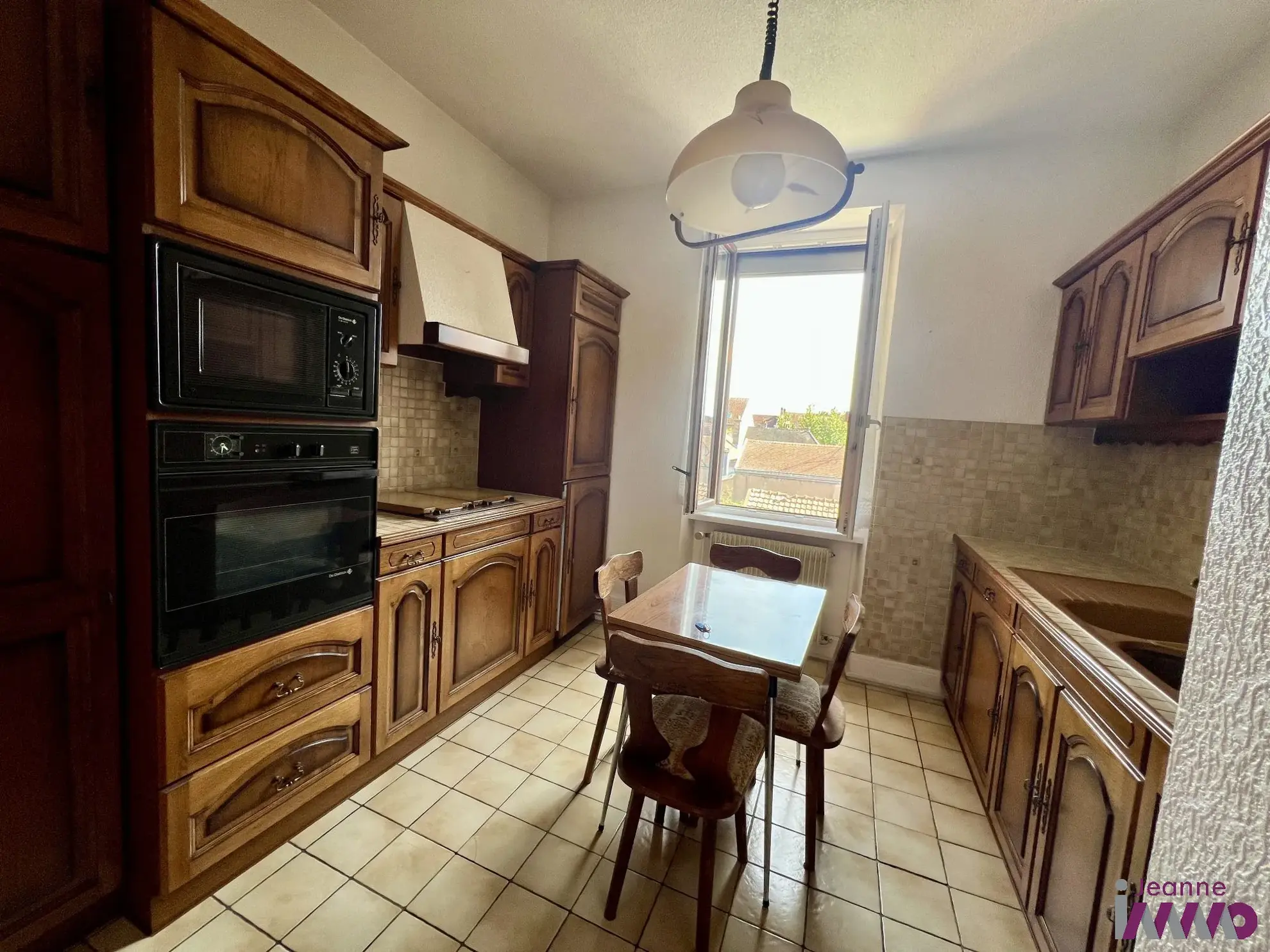 Appartement T4 à Belfort avec garage, jardin et annexes – Idéal vie de quartier 