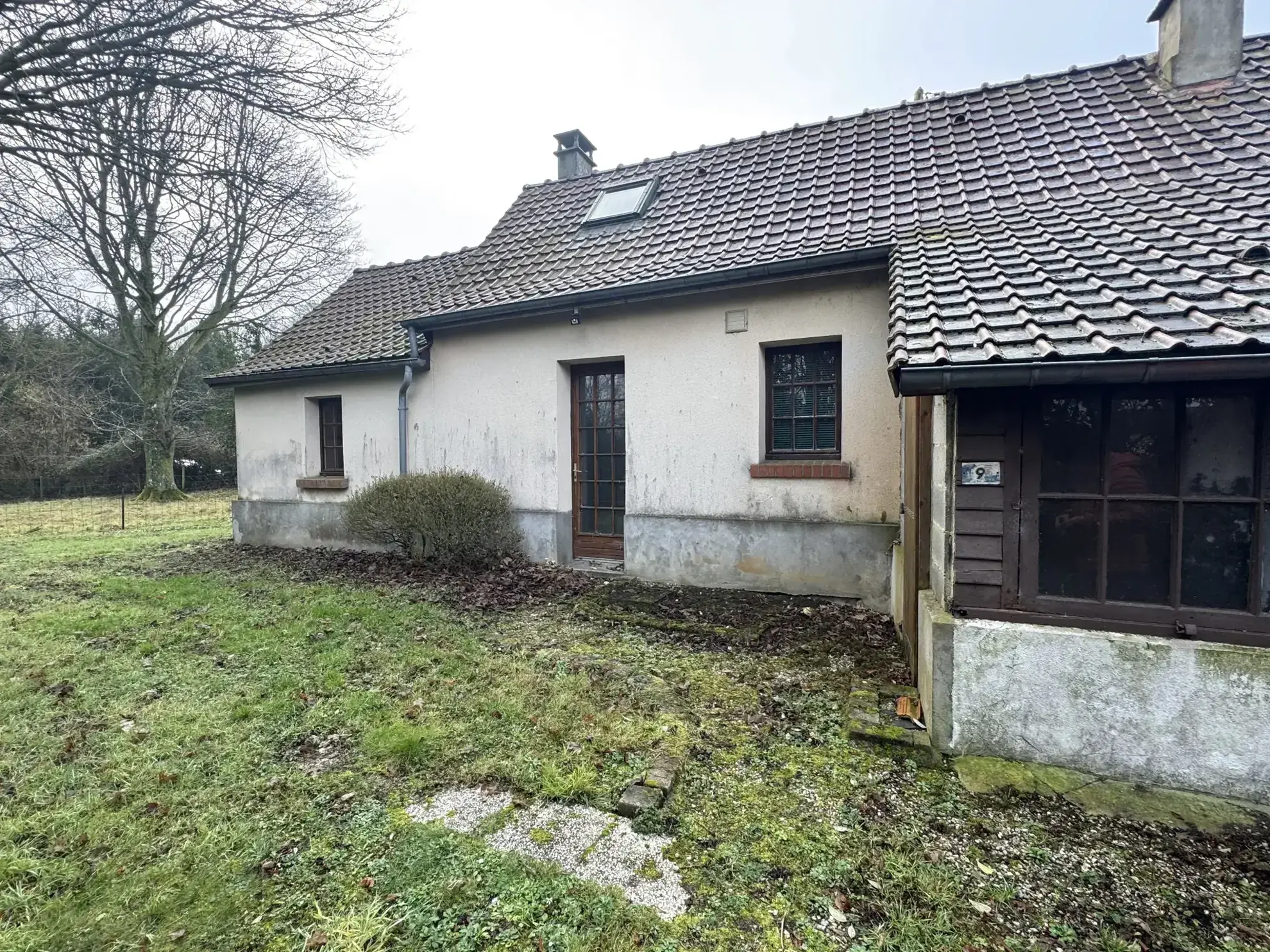 Maison mitoyenne à Fressenneville avec jardin et potentiel à vendre