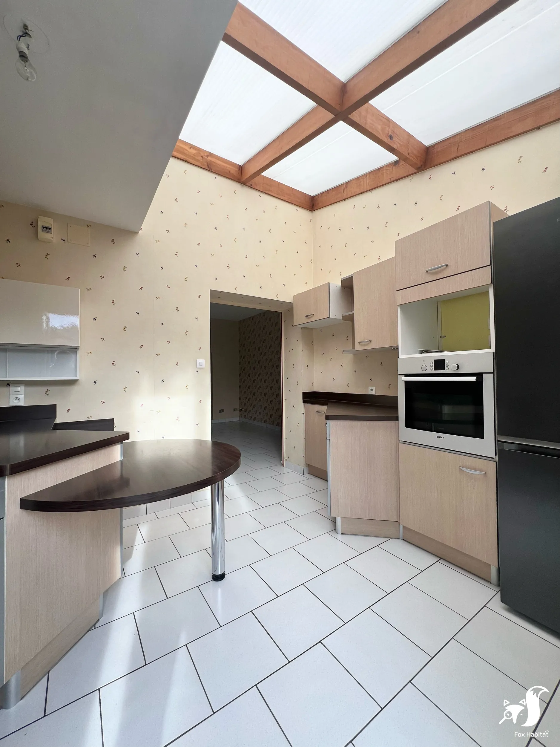 Maison mitoyenne à Neuville-Saint-Rémy – 129 m², 4 chambres, garage et espace extérieur 