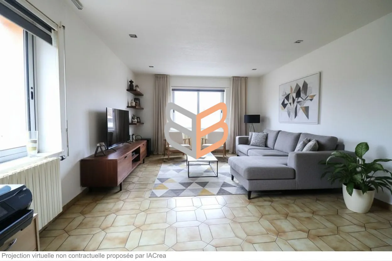 Appartement rénové de 120 m² en rez-de-chaussée à Thil avec terrasse et jardin 