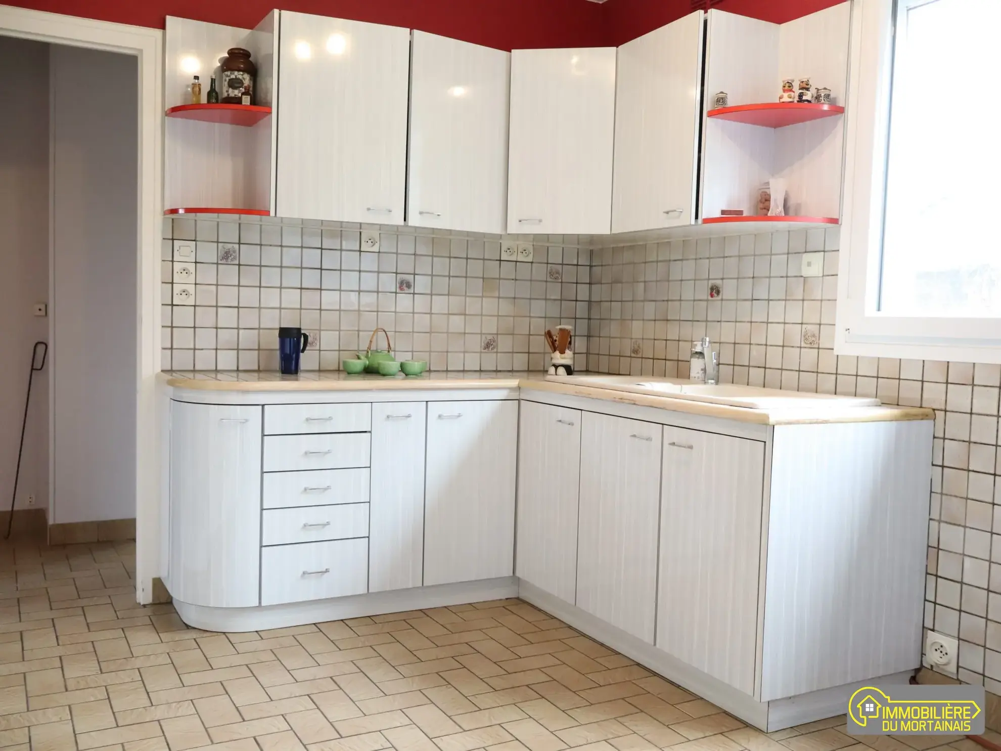 Maison de ville à Mortain-Bocage avec garage et cave - Fonctionnelle et à proximité des commodités 