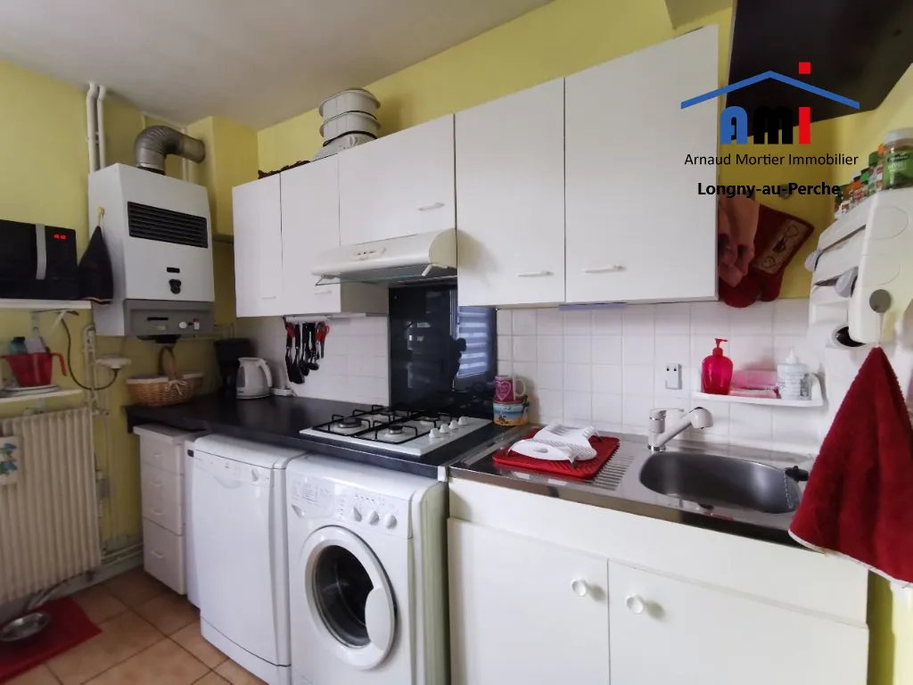 Maison de ville ancienne de 65 m² avec jardin et accès rivière à Longny au Perche 