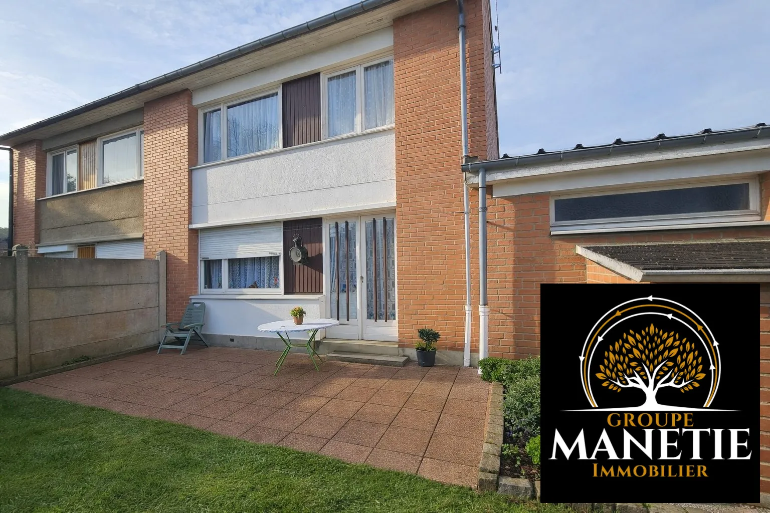 Maison semi-mitoyenne avec jardin, terrasse et garage à Cuincy