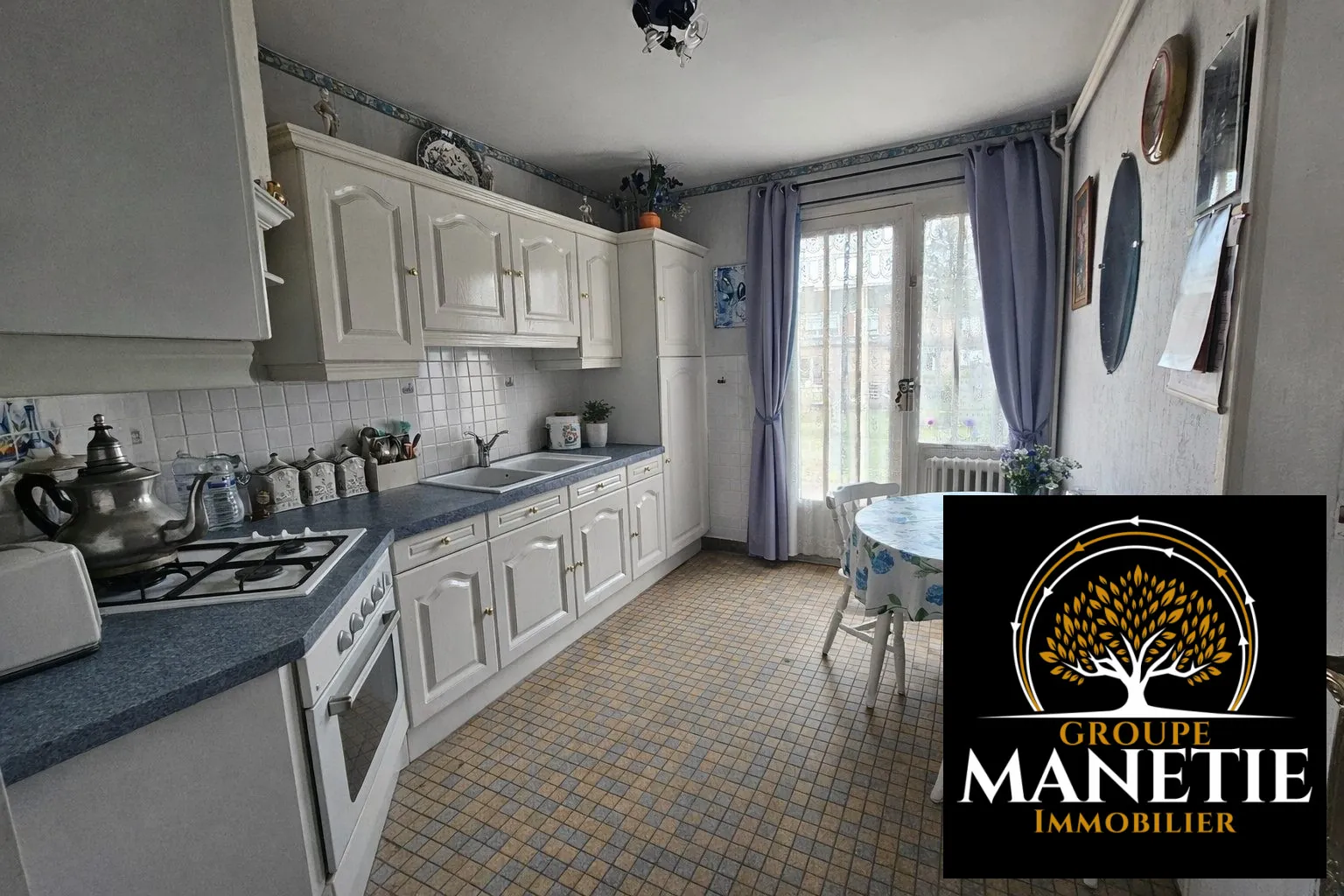 Maison semi-mitoyenne avec jardin, terrasse et garage à Cuincy 