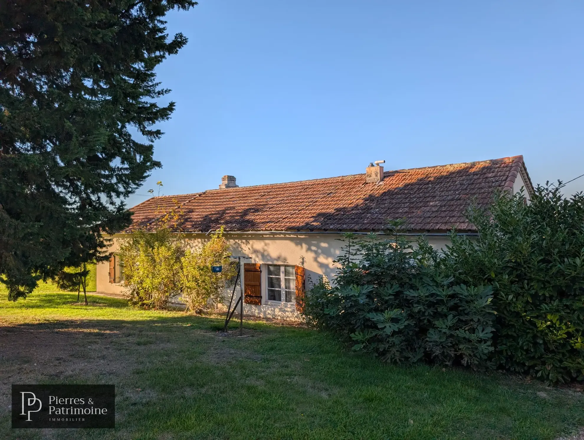 Maison en pierre de plain-pied avec jardin à Mézin - Investissement ou résidence 