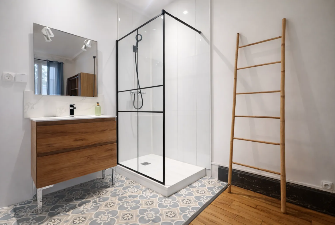 Appartement haussmannien à vendre à Nancy avec balcon, double suites et parking gratuit 