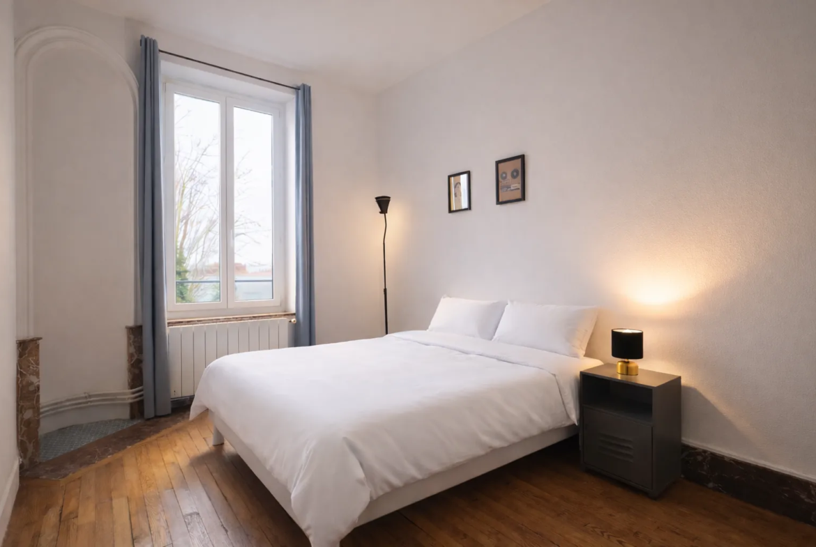 Appartement haussmannien à vendre à Nancy avec balcon, double suites et parking gratuit 