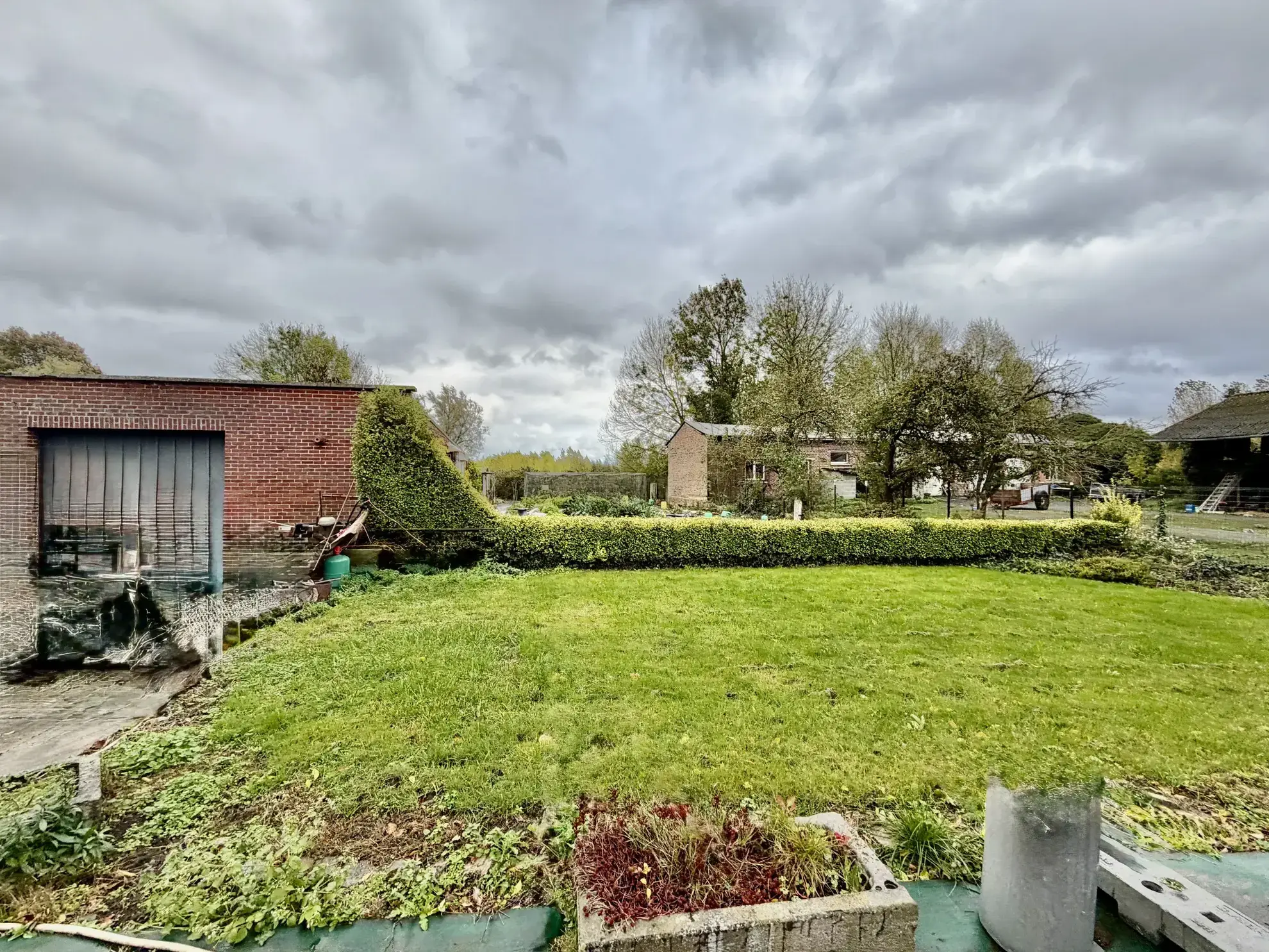 Maison familiale à Wallers avec grand terrain et garage - Potentiel à exploiter 