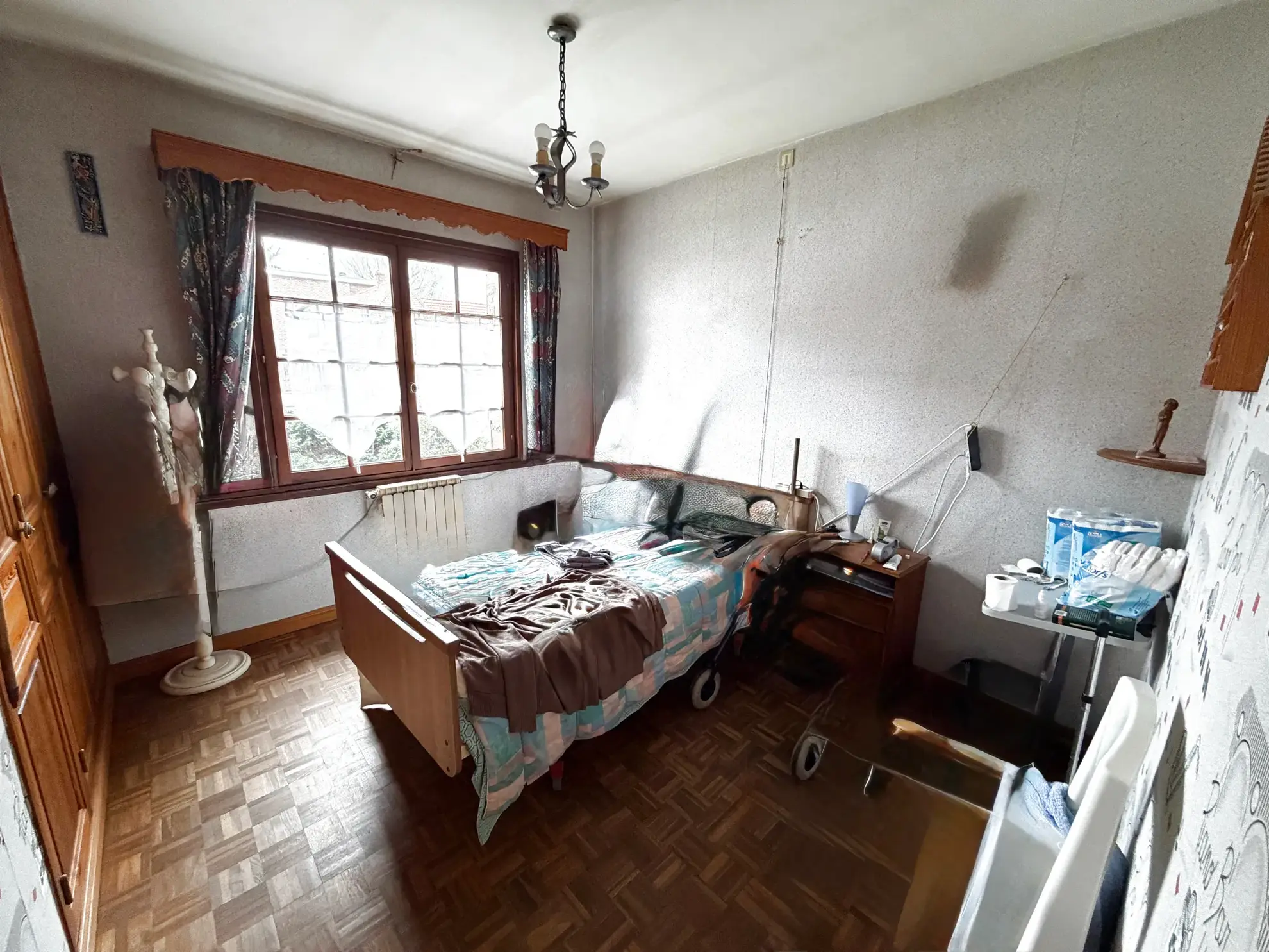 Maison familiale à Wallers avec grand terrain et garage - Potentiel à exploiter 