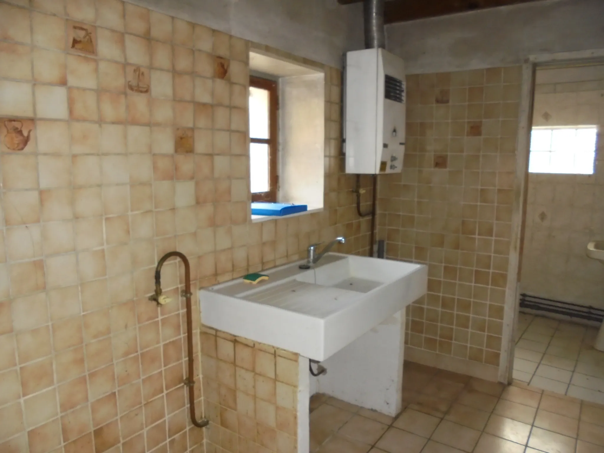 Maison ancienne de 44 m² avec jardin et parking proche de La Réole 