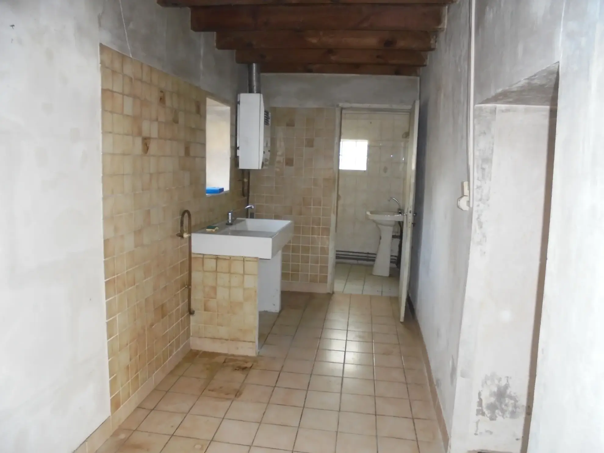 Maison ancienne de 44 m² avec jardin et parking proche de La Réole 