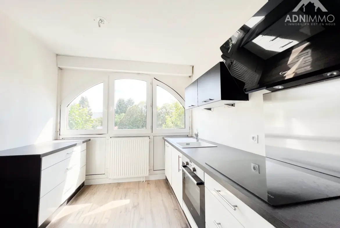 Appartement T2 de 53 m² à Saint-Genis-Pouilly avec balcon et garage 