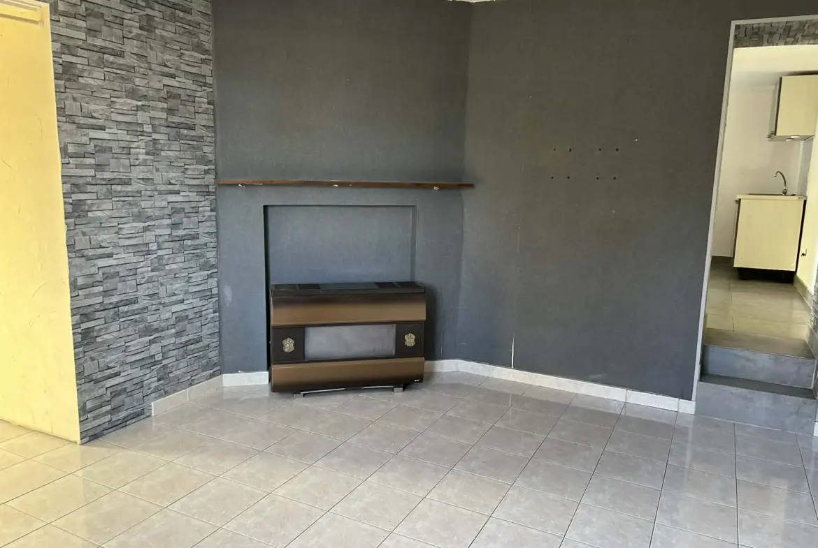 Maison semi-individuelle à vendre à Aulnoye-Aymeries – Charmante propriété avec dépendance 