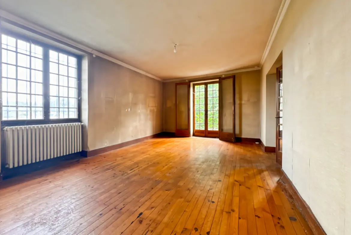 Maison à Reyrieux avec grand potentiel et terrain privé de 50 m² 