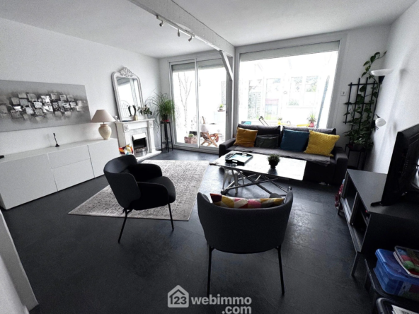 Maison mitoyenne de 103 m² à vendre à Bondoufle avec jardin et garage