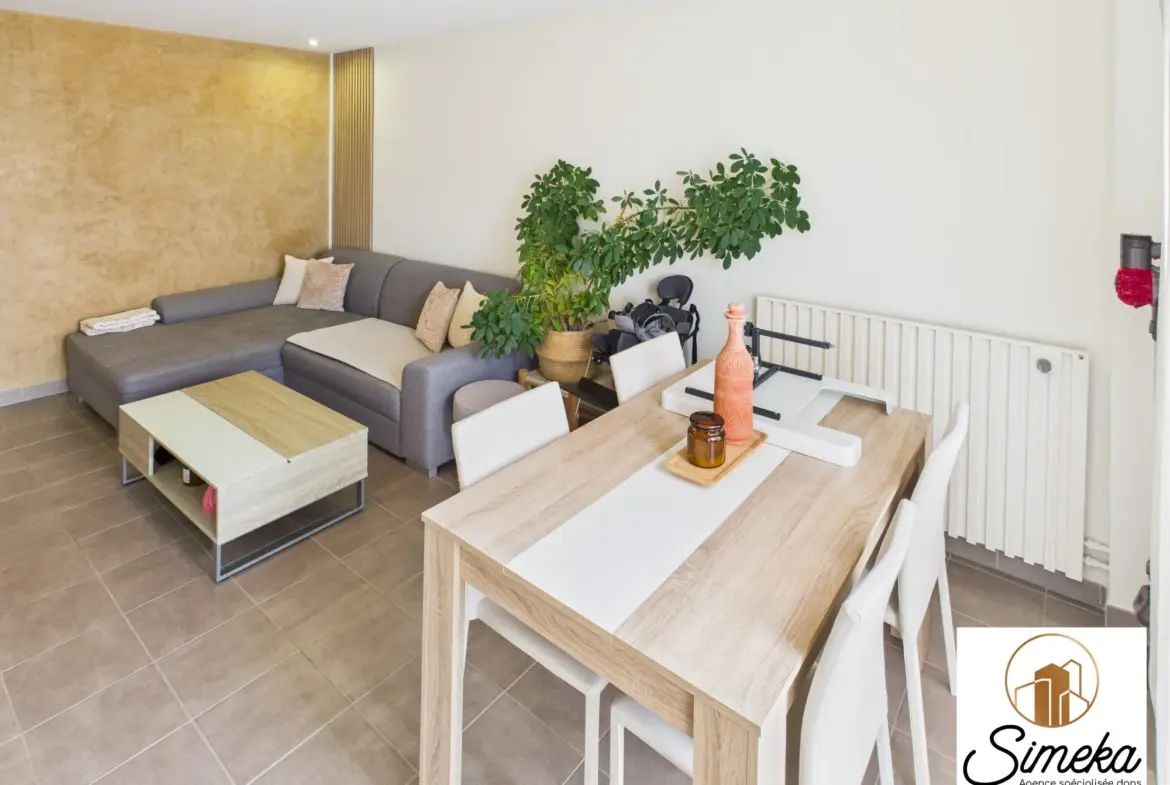 Appartement T2 rénové avec balcon à La Chapelle-Saint-Luc, secteur calme 