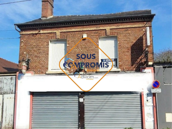 Immeuble mixte avec local commercial, logement et dépendances à Beauvais