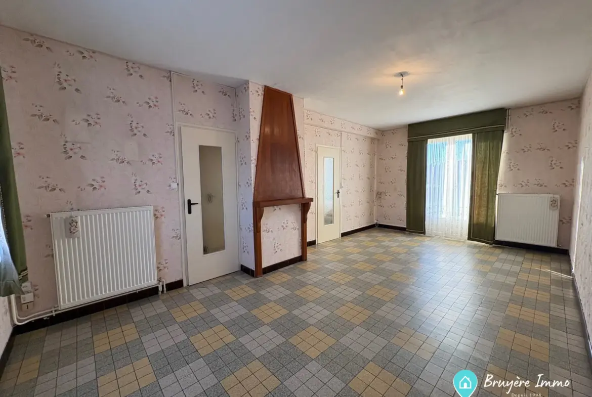 Maison à vendre à Berlaimont avec grand jardin et potentiel de personnalisation 