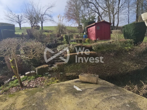 Maison à vendre à Longwé avec jardin, garage et extérieur convivial