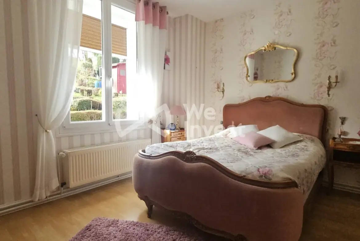 Maison à vendre à Longwé avec jardin, garage et extérieur convivial 
