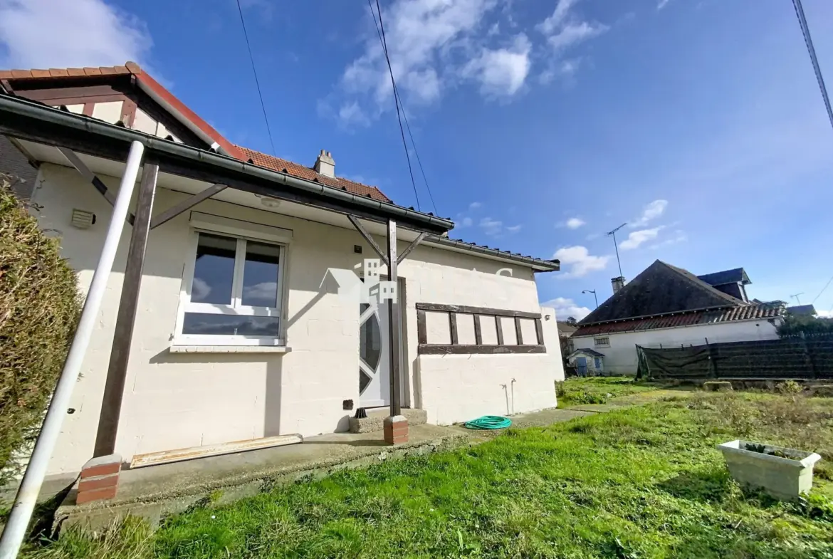 Maison jumelée au Trait avec forte extension et potentiel de rénovation 