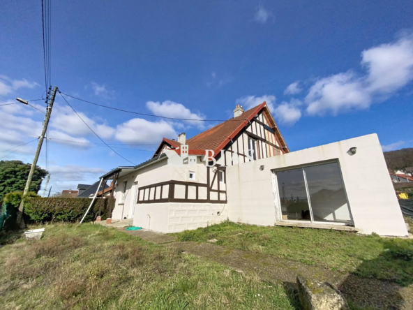 Maison jumelée au Trait avec forte extension et potentiel de rénovation