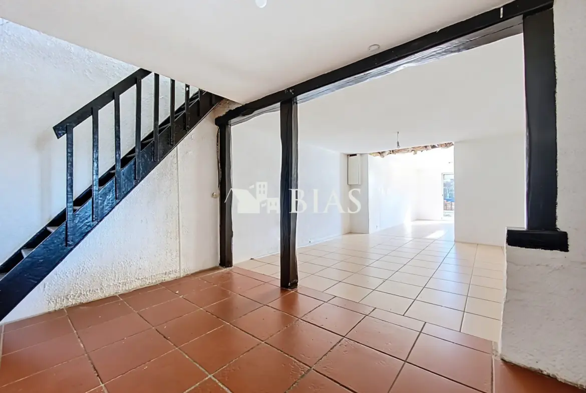 Maison jumelée au Trait avec forte extension et potentiel de rénovation 