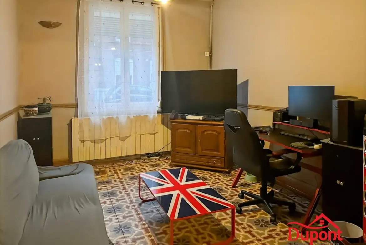 Maison familiale à Denain avec 4 chambres, jardin et cave 