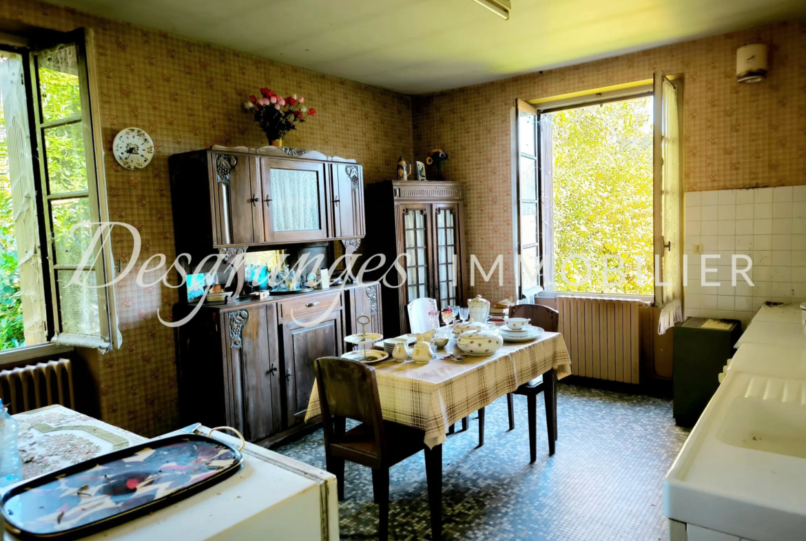 Propriété authentique avec vues dégagées et grandes granges à Génès 