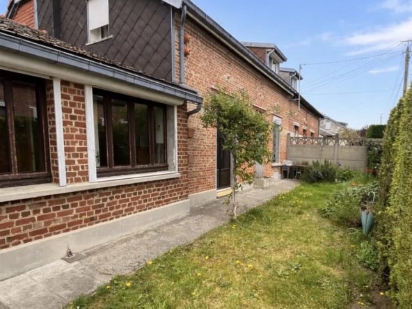 Maison mitoyenne à vendre à Le Cateau-Cambrésis avec jardin et garage en secteur calme