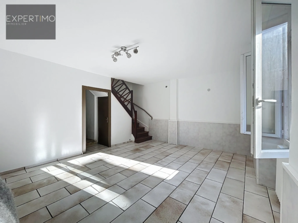 Maison de ville avec jardin et toiture neuve à Aubin 70m²