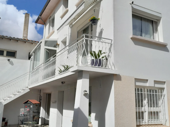 Belle maison de ville avec jardin et garage à Moissac, idéalement située