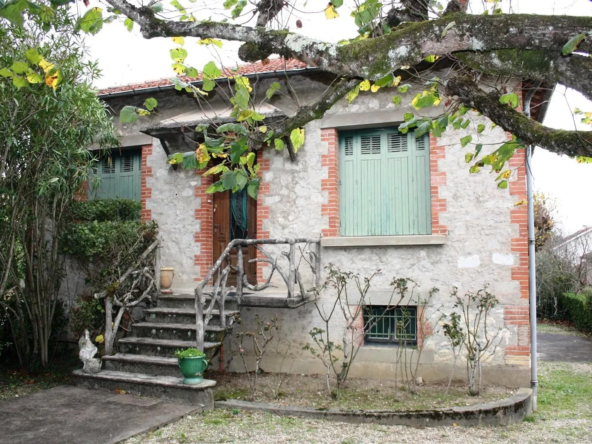 Maison en pierre des années 30 à rafraîchir avec jardin à Graulhet