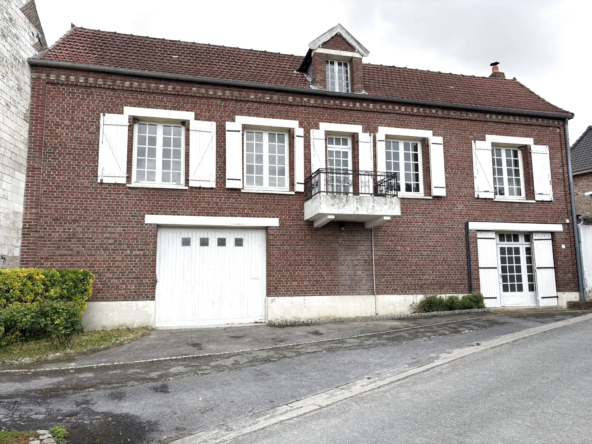 Maison à vendre à Long avec garage, jardin et grand potentiel d'aménagement