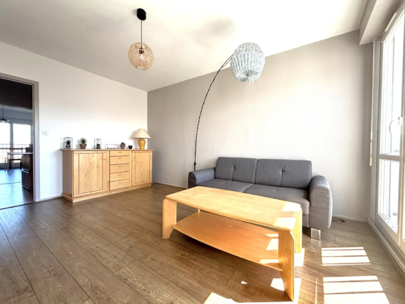 Appartement T3 à Beaumont avec vue dégagée, parking et ascenseur