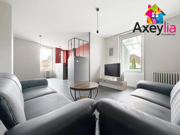 Maison rénovée à Roanne avec 3 chambres, garage et terrasse proche centre-ville