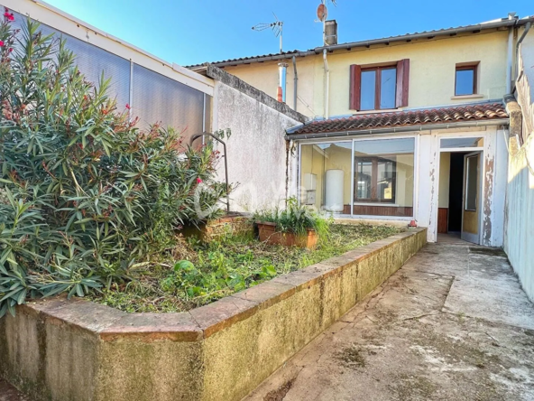 Maison de ville avec jardin et garage à Saint-Sulpice-la-Pointe - 74m²